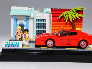 Ein Lego-Modell von Miami mit einem roten Sportwagen, einer Palme und zwei Figuren, die am Strand stehen.
